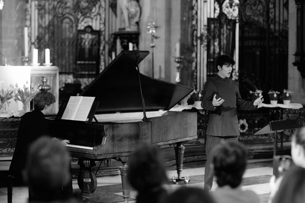 Gleb performing alongside a pianist