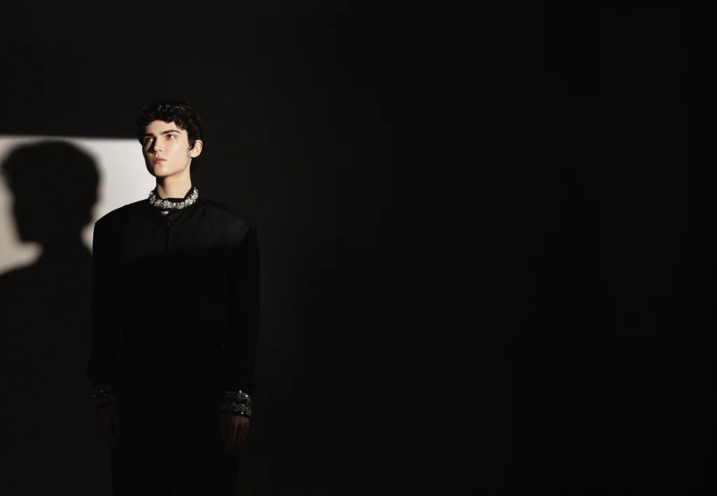 Gleb wearing a dark outfit