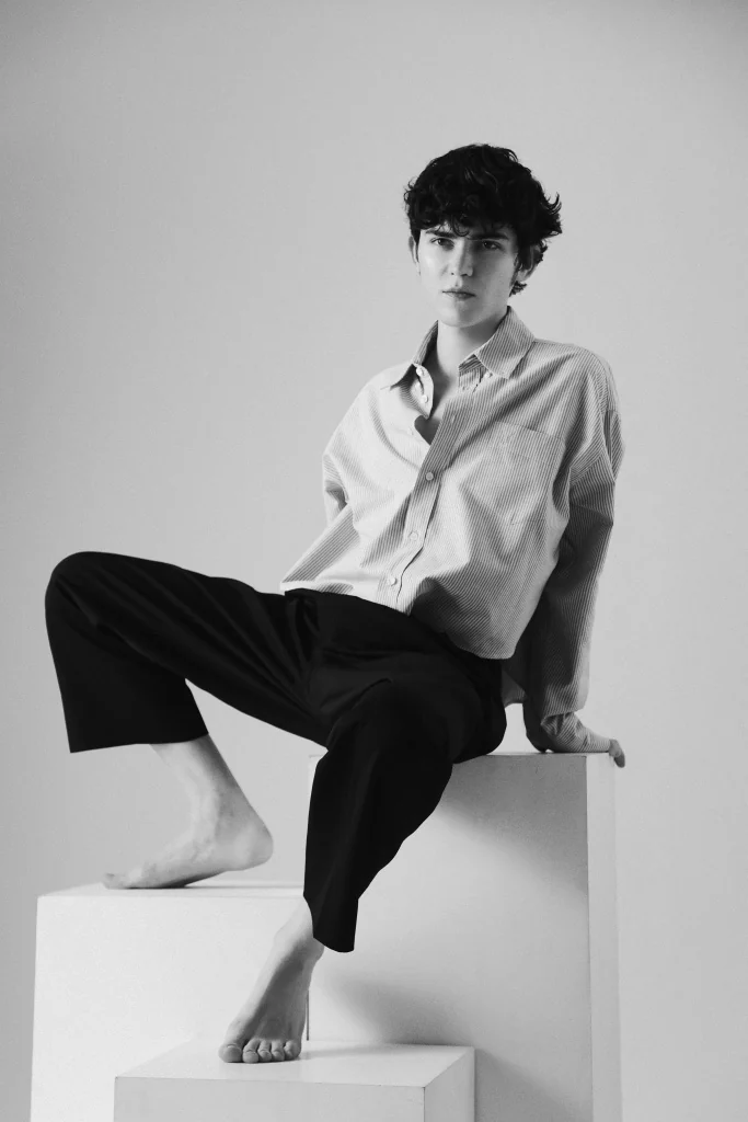 Gleb seated in a white shirt — video preview