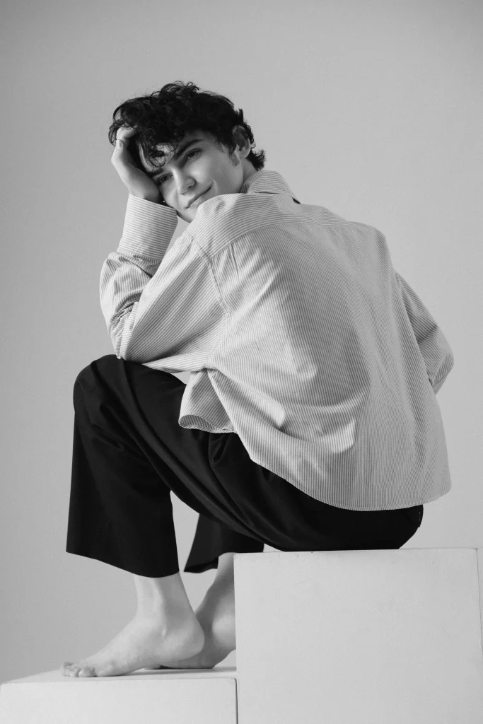 Gleb resting his head on his hand